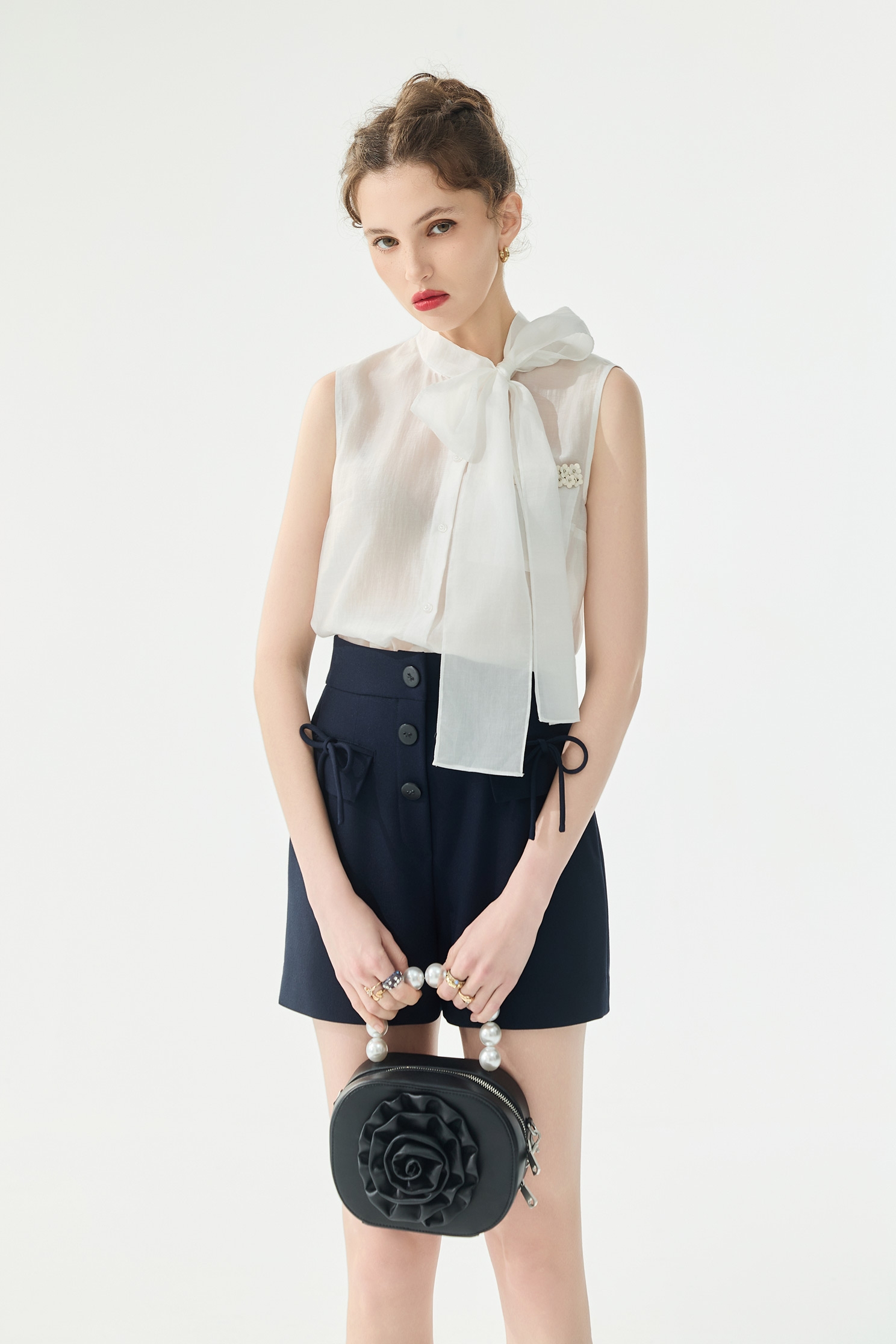 光學白綴蝴蝶結上衣光學白綴蝴蝶結上衣,一般背心,一般背心馬甲,上衣,春夏穿搭,白色背心,背心,蝴蝶結