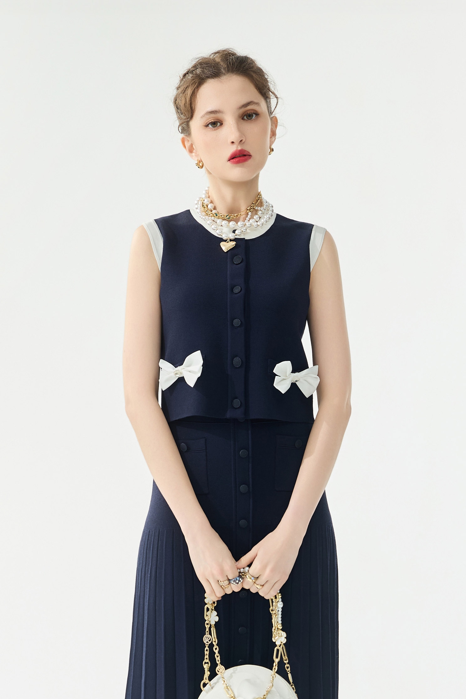 經典海軍藍針織配色背心經典海軍藍針織配色背心,一般背心,一般背心馬甲,上衣,春夏穿搭,背心,蝴蝶結,針織,針織背心