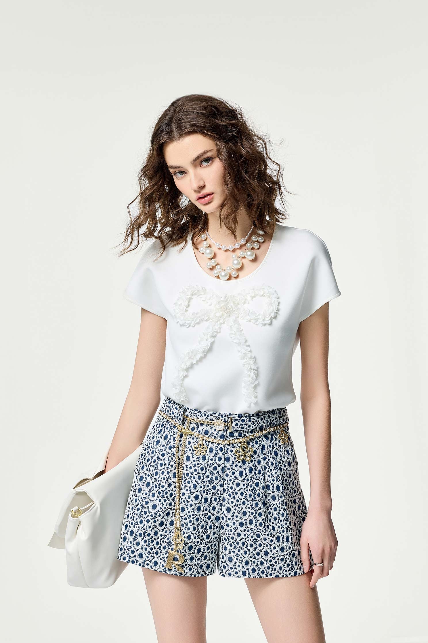 雷射立體花蝴蝶結上衣雷射立體花蝴蝶結上衣,T-Shirt,上衣,春夏穿搭,約會特輯,蝴蝶結