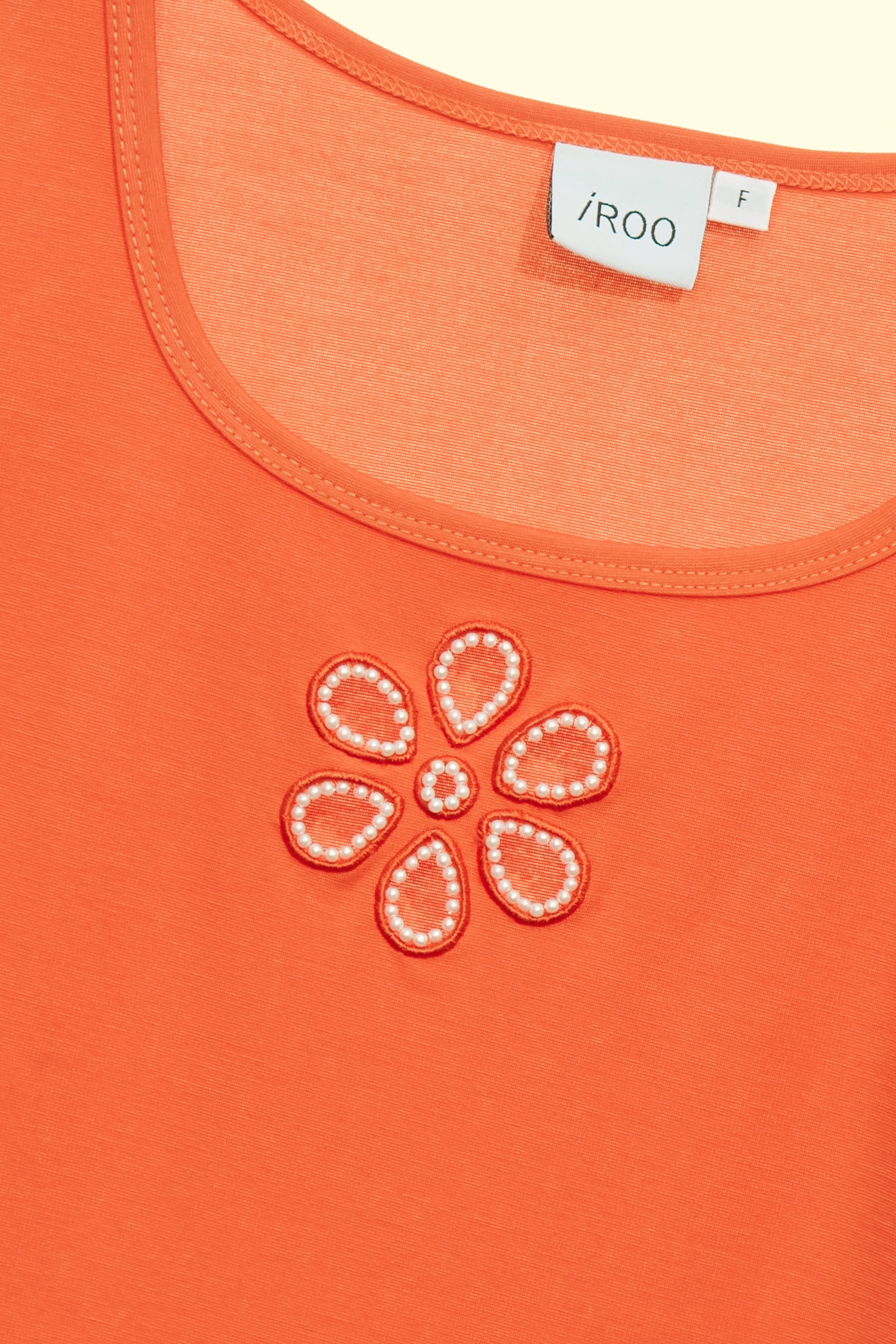 落日珊瑚色簍空花T恤上衣落日珊瑚色簍空花T恤上衣,T恤,上衣,春夏穿搭,珍珠,花花世界,荷葉